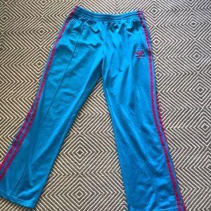 Adidas turquoise track pants with pink stripes